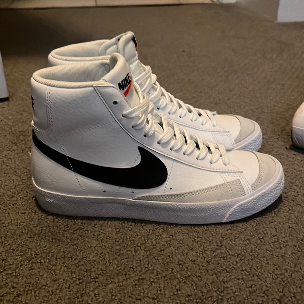 Nike White and Black High-Top Sneakers with Red Logo Accent